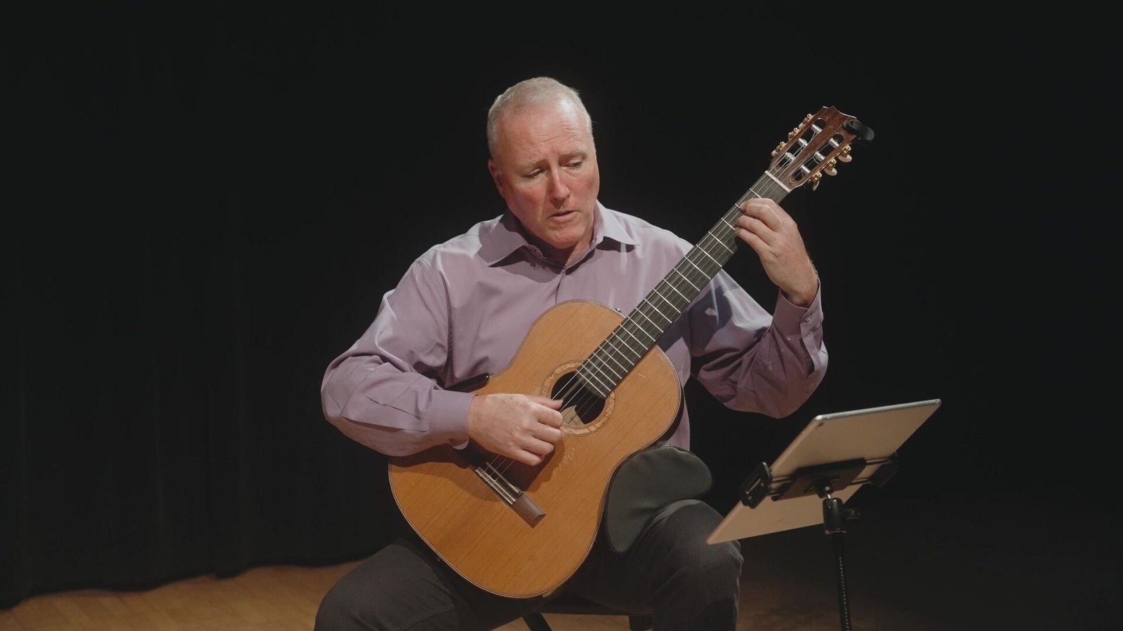 Steven Dearing playing classical guitar